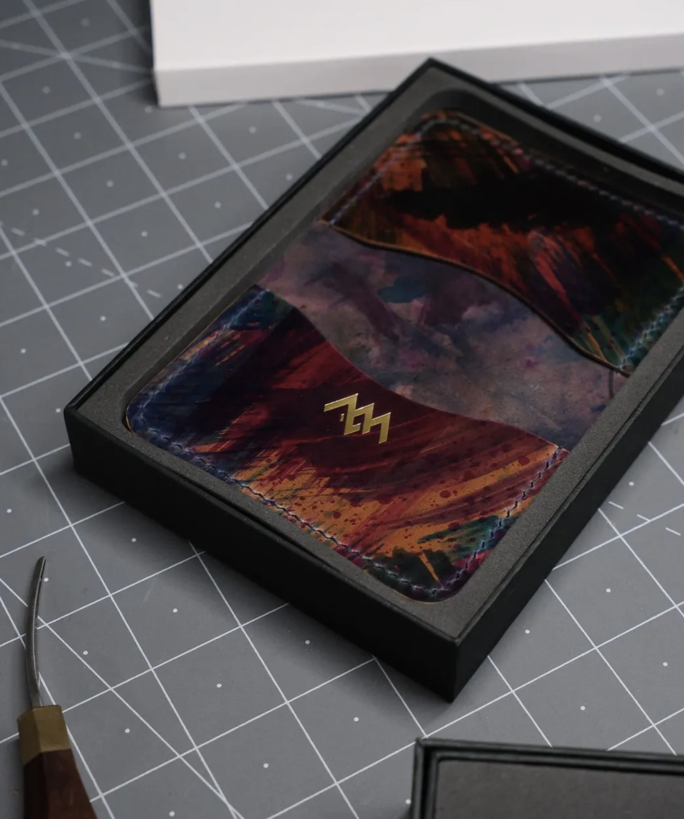 Painted leather wallet in box